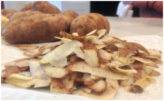 a pile of potatoes on a table